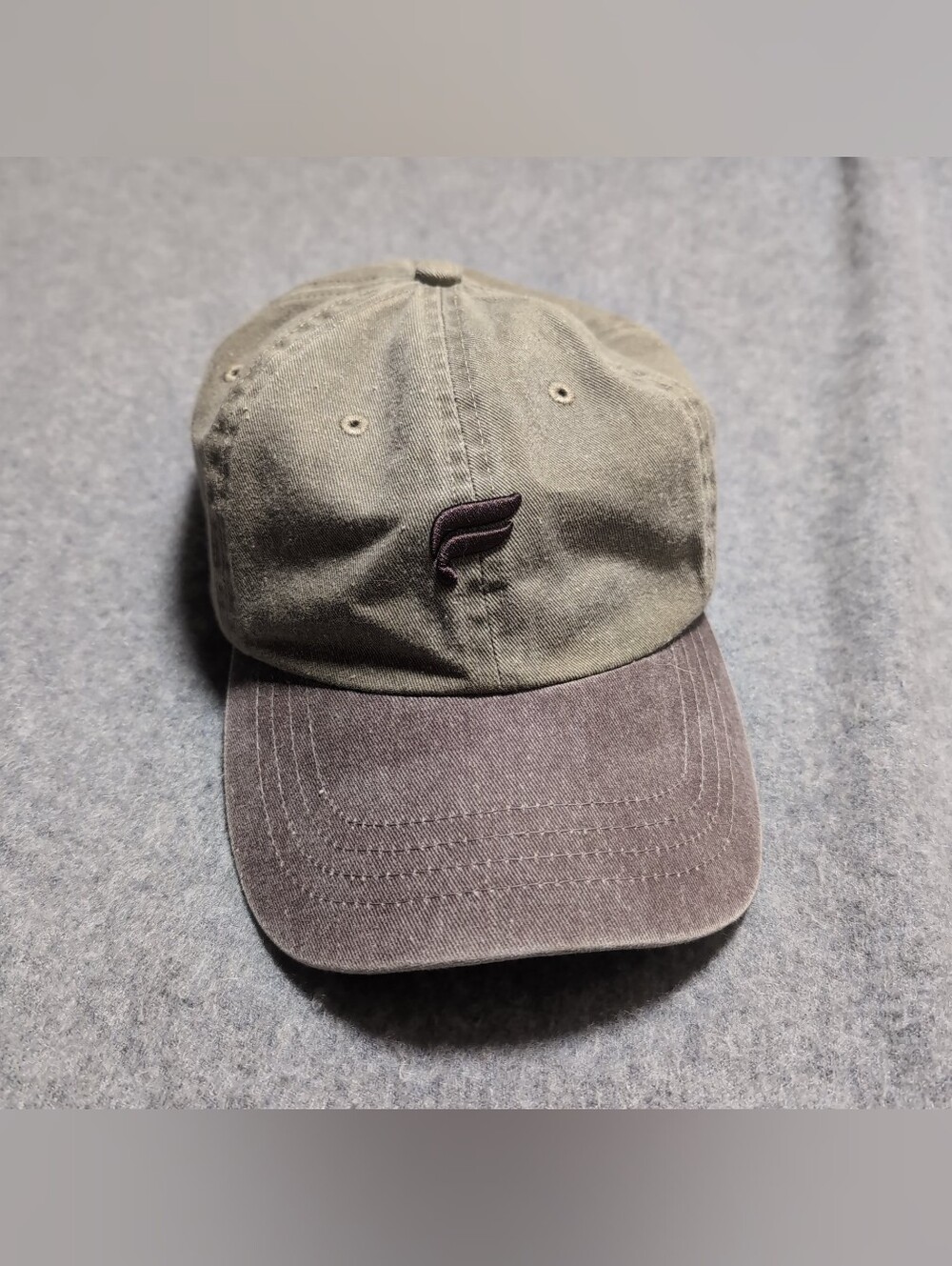 Fabletics baseball cap in olive green and brown